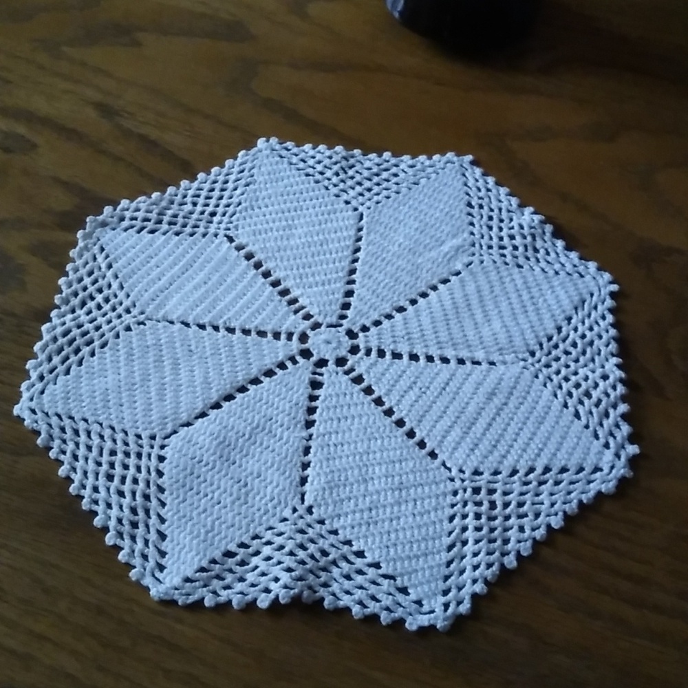 Vintage hand crocheted doily. Approx 10 inches.